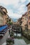 Tourists walk through the old town. Annecy, France.