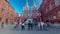 Tourists walk on Red Square near the branch of the Historical Museum and the zero kilometer in Moscow. timelapse