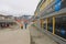 Tourists walk by the street of Longyearbyen, Norway.