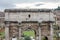 Tourists walk and take pictures in the photo on the tour of the ancient ruins of the ancient imperial capital of the Roman Forum i