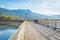 Tourists walking along the curved pier in Salmon Arm, BC, Canada