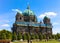 Tourists are walking around Berliner Dom building. Berlin Cathedral