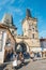 Tourists walking on Charle Bridge during beautiful autumn day, Prague, Czech Republic