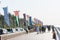 Tourists walking at the crescent road in the Palm Jumeirah island in Dubai of the United Arab Emirates