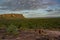 tourists walking down from the Nadab Lookout in ubirr, kakadu national park - australia, northern territory