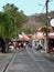 Tourists Walking Down Street in Fond-du-Cure