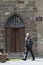 Tourists walking by the medieval village of Salers France