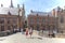 Tourists walking in the narrow streets in the center of Bruges. Bruges is also called the Venice of the North due to the numerous