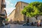 Tourists walking near the ancient catholic church in Rimini, Italy