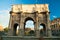 Tourists walking near Constantine\'s arc in Rome