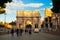 Tourists walking near Constantine\'s arc in Rome