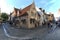 Tourists walking in a old street of Bruges, a medieval town of Belgium
