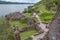 Tourists walking in the ruins of Urquhart Castle, Loch Ness, Scotland