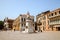 Tourists are walking on Santo Stefano square in summer midday