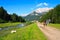 Tourists walking scenic path in Dolomites