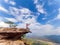 Tourists watch the atmosphere, sky and clouds above the Mekong mountain at Pha Chanadai. Ubon Ratchathani.