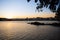 Tourists watch a beautiful sunset in the bay of Sao Vicente, Brazil