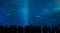 Tourists watch the behavior of a large whale shark inside Okinawa Churaumi Aquarium