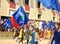 Tourists watching the colorful and fancy traditional costume parades at the horse race, Palio di Siena, held in medieval square