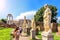 Tourists watching each other and the Statues of virgins near the House of the Vestals, Roman Forum