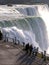 Tourists watching the magnificent waterfall Niagara Falls, USA