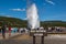 Tourists Watching Old Faithful Erupt