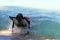 Tourists were sleeping and resting on the beach chairs At that moment a big wave suddenly hit him