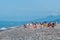 Tourists (young women) sunbathe on Batumi Beach