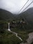 Tourists on zipline adventure ride at Manto de la novia Bridal Veil waterfall Pastaza river Banos Tungurahua Ecuador