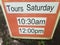 Tours Saturday sign with morning and afternoon hours