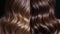 From tousled to polished: a side-by-side comparison of brunette hair, highlighting the stark contrast between natural