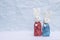 Tow little Rabbit doll in Japanese blue and red dress over blurred background