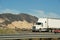 Tow truck and other vehicle circulating on Interstate Freeway 5