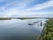 towboat with barges on the Mississippi River at confluence with the Missouri River