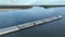 towboat with barges on the Mississippi River at confluence with the Missouri River