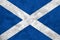 Towel fabric pattern flag of Scotland, it is a blue field with a white diagonal cross that extends to the corners