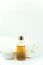Towel with salt and bottle natural organic oil essence serum.