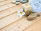 Towel, tiare flower, soap, stones and fish shaped nail brush