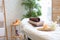 Towels, candles and flower on massage table