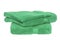 Towels isolated. Closeup of a stack or pile of green soft terry bath towels isolated on a white backgroun