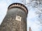 Tower and bare tree branches in Milan in spring