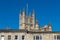 The tower of Bath Abbey viewed with Terrace Walk in the foreground