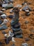 Tower of Beach Pebbles upright on sand