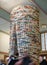 The tower of books placed at the entrance of the Municipal Library of Prague