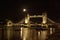 Tower bridge, full moon above, with river Thames illuminated in