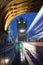 Tower bridge in London on a December morning with a bus blur