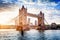 Tower Bridge in London, the UK at sunset. Drawbridge opening