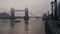 Tower Bridge and River Thames, iconic London skyline scene with beautiful misty colourful sunrise on