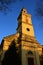 Tower of classicistic German evengelic church in Modra with typical square shape and columns.