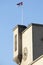 Tower with clock and serbian flag on a pole, Veterans` home, Belgrade, Serbia